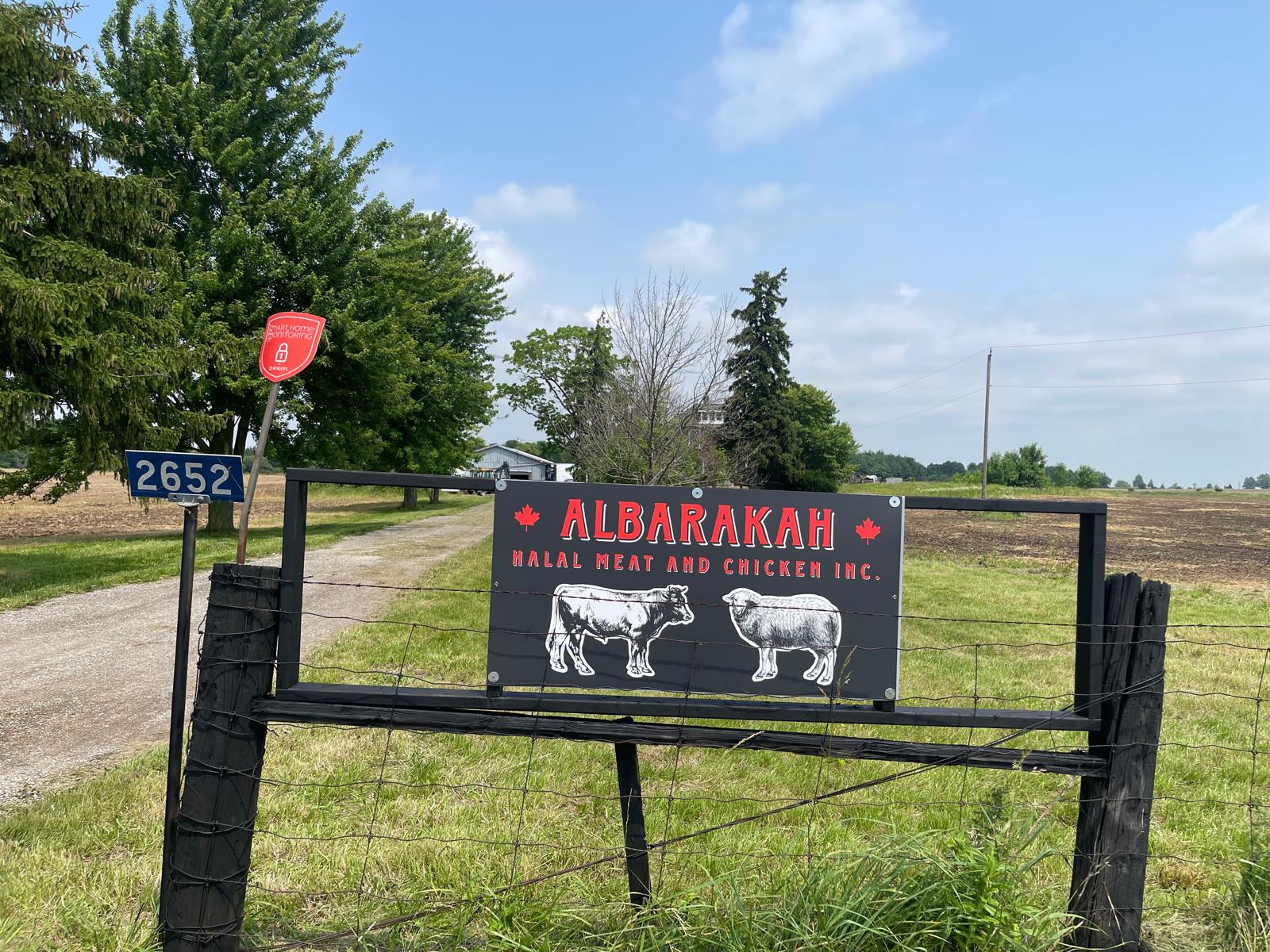 Albarakah Halal Meat and Chicken Inc. sign at the farm gate on Scotland Drive
